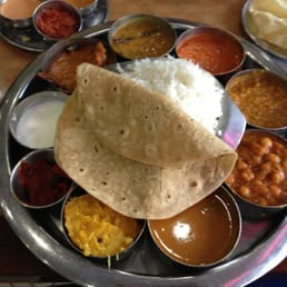 Sapthagiri signature dishes Sapthagiri Special ThaliSouth Indian ThaliButter Paper Masala Dosa